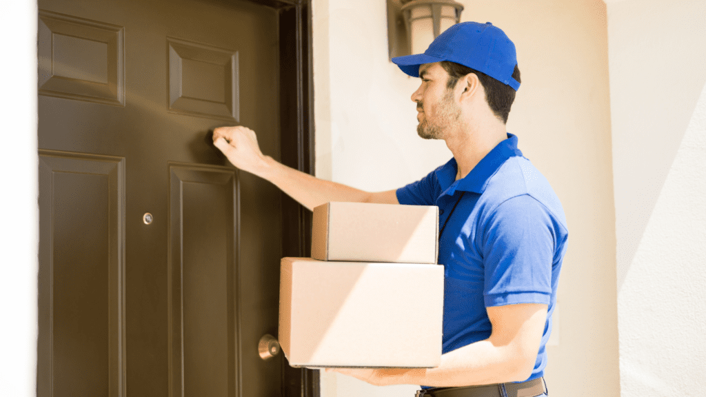 Courier carrying packages to customer doorstep